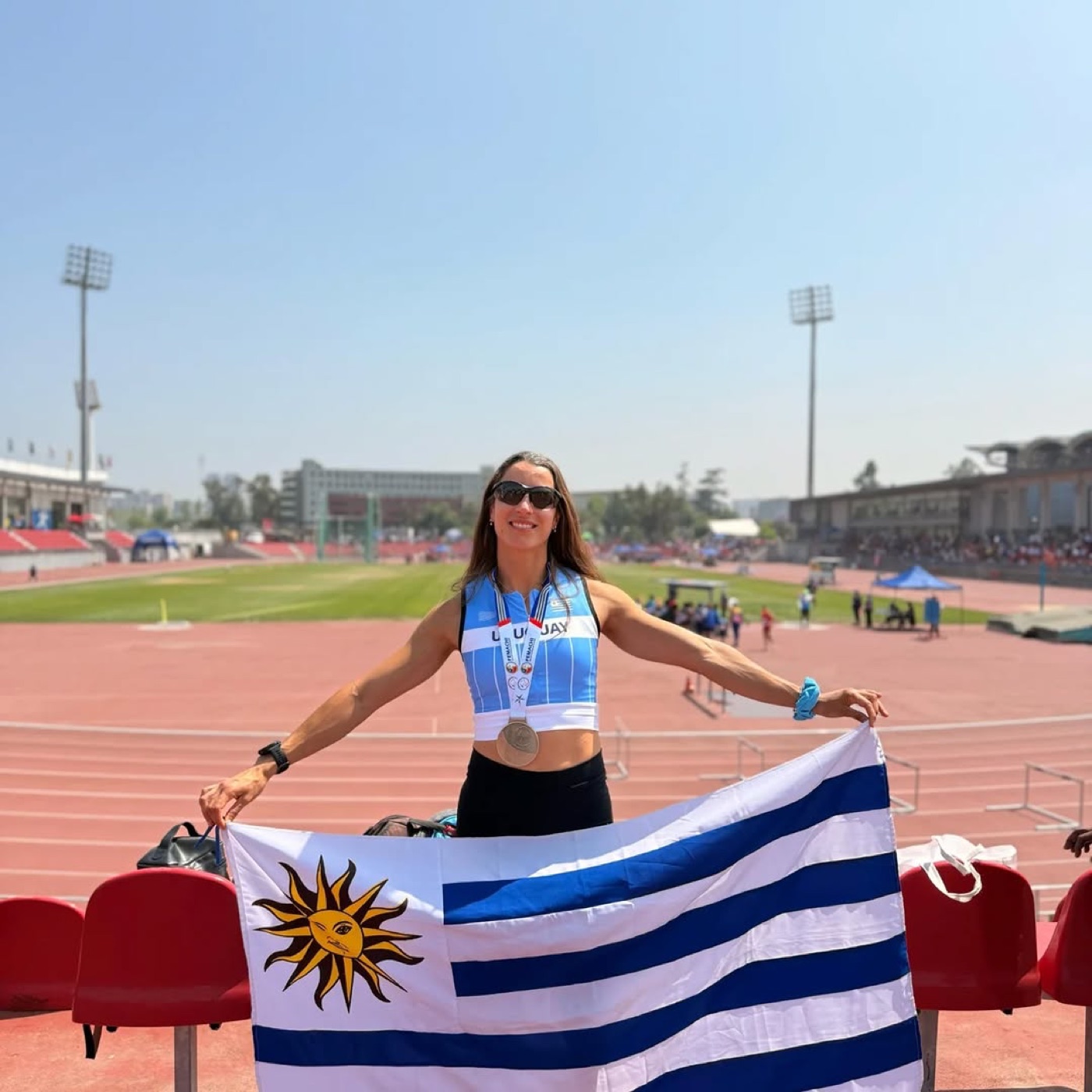 Camila, South American champion, with the Uruguayan flag